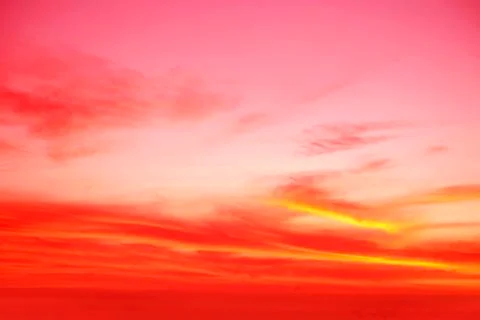 Sunlit clouds in summer sky Stock Photos