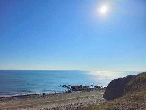 Sunlit Coastal View at Easington Colliery Beach Stock Photos
