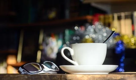 A sunlit coffee cup Stock Photos