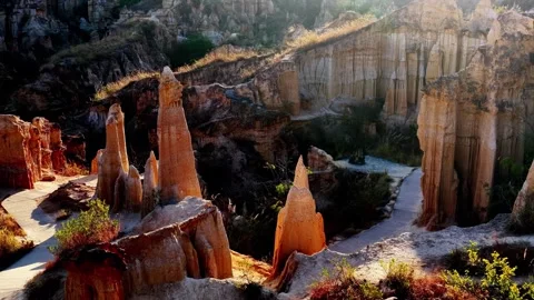Sunlit Eroded Earth Pillars and Formations in Wumao Earth Forest Chuxiong 動画素材 346737876