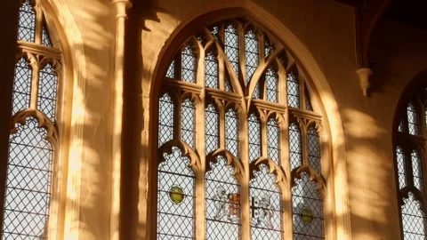 Sunlit Glass Window With Arched Frame Inside St. Mary's Church In Saffron Stock Footage 328692490