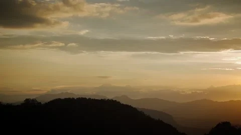 Sunlit horizon over distant mountains at early morning Video stock 316796093