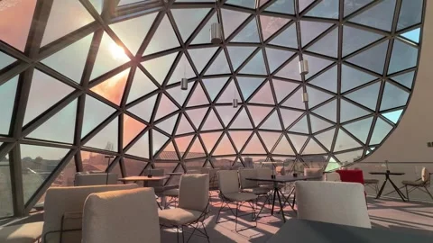 Sunlit Lounge Seating Inside Geometric Glass Dome of Oscar Niemeyer Sphere Video stock 342471978
