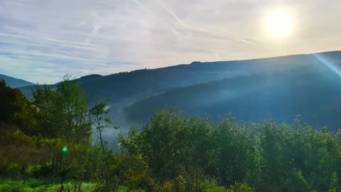 Sunlit Mountains and Valleys Vídeo Stock 296361400