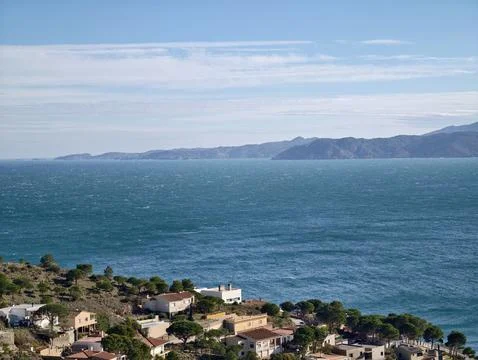 Sunlit Ocean Scene With Distant Headlands And Endless Horizon Inspiring Stock Photos
