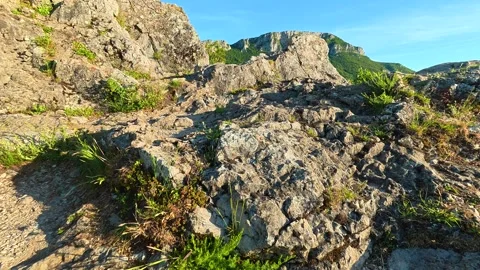 Sunlit path winds through rocky terrain. Sicevo Gorge, Serbia. Stock Footage 337052217