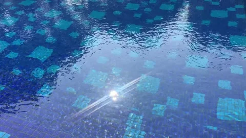 Sunlit Reflections on a Mosaic Pool Stock Footage 287994422