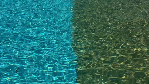 Sunlit Ripples Over Sandy Seabed. Vivid Turquoise And Green Waters Display Stock-Footage 337940117