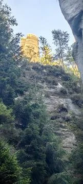 Sunlit Rock Tower Framed by Cliffs Adrspach View 4K Stock Photos
