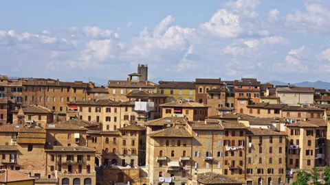 Sunlit Rooftops Overlooking Siena’s Cityscape in Tuscany Stock Footage 256023539