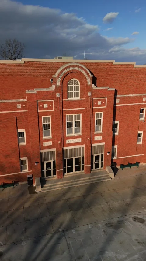 Sunlit School With Entry Path and Bright Facade Stock Footage 311444520