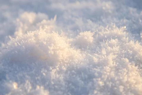 Sunlit snow surface Stock Photos