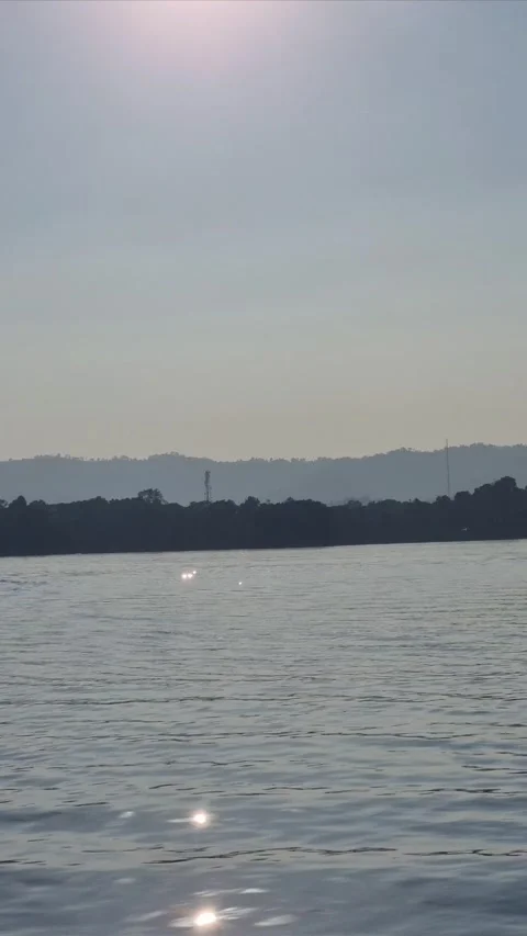 Sunlit Sparkles on Tranquil Lake Stock Footage 304154246