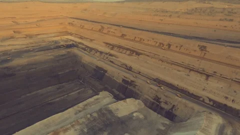 Sunlit Thar Engro Coal Mining Pit with Steep Cut Walls Stock Footage 344056477
