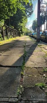Sunlit urban path Stock Photos