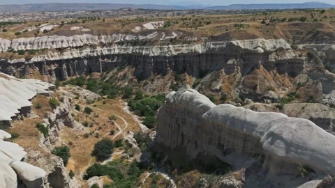 Sunlit valleys and ancient whispers in Cappadocia Stock Footage 344174997