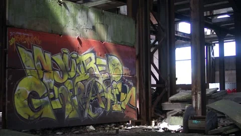 Sunlit Wall With A Graffiti At An Angle Stock Footage 130897839