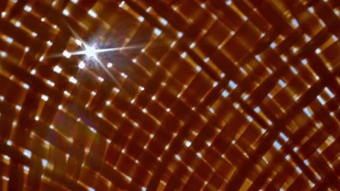 Sunlit Wicker Basket Weave With Starburst Light Abstract Brown Background Stock Footage 340631595