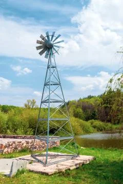 Sunlit windmill close-up Stock Photos
