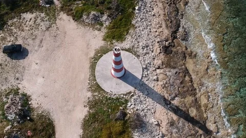 Sunny Aerial View of Pinders Point Ancient Lighthouse, Grand Bahama Stock Footage 88737638