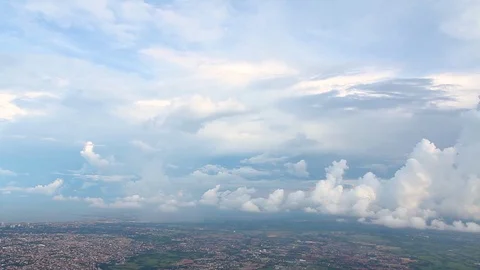 A sunny and bright cloudscape over the city Stock-Footage 120553473