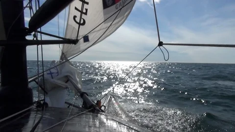The sunny Arctic Ocean seen from a moving sailboat Stock Footage 104853659