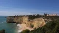Sunny beach and cliffs landscape at Algarve coastline Portugal 4k or 4k+ Resolution