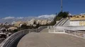 Sunny beach city landscape pan with blue sky and clouds in Portimao Portugal 4k or 4k+ Resolution