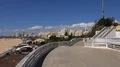 Sunny beach city landscape pan with blue sky and clouds in Portimao Portugal 4k or 4k+ Resolution