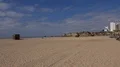 Sunny beach landscape scenery with sky and clouds in Portimao Portugal 4k or 4k+ Resolution