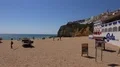 Sunny beach scenery in Algarve tourism location Carvoeiro, Portugal 4k or 4k+ Resolution