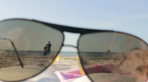 Sunny Beach through Glasses Stock Footage 25809113