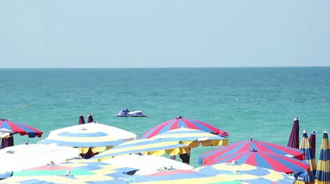 Sunny beach umbrellas Stock-Footage 22636942