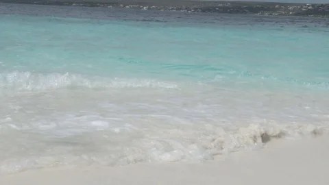 Sunny beach waves in slowmotion Stock Footage 80380525