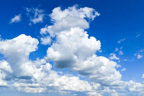 Sunny blue sky background with cloudscape. Background with clouds on blue sky Stock-Fotos