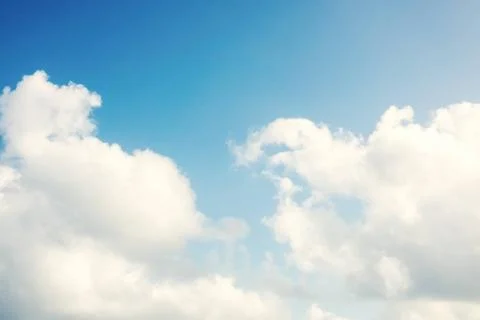 Sunny blue sky cloud background An image of a sunny blue sky cloud backgro... Stock Photos