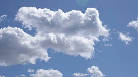 Sunny blue sky with clouds Stock Footage 128253869