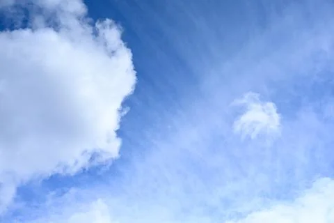 Sunny Blue Sky with Floating Clouds for Travel, Sports and Nature Backgrounds Stock Photos