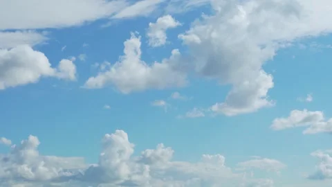 Sunny blue sky with fluffy clouds in good weather time lapse, slow motion. Blue  Stock-Footage 314716072