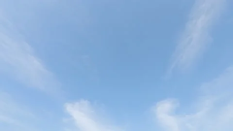 Sunny clear blue sky background with airy white clouds n cloudscape Video stock 149666806