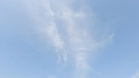 Sunny clear blue sky background with airy white clouds n cloudscape Video stock 149666823