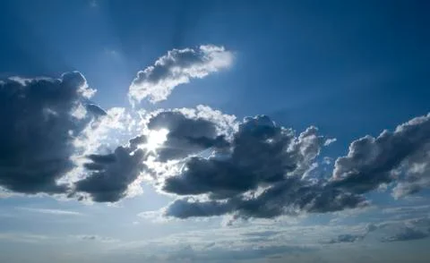 Sunny clouds with rays of light Stock Photos