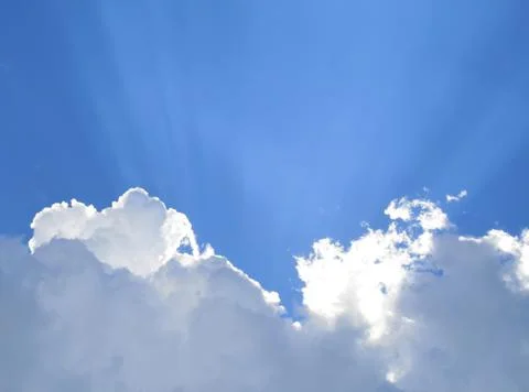Sunny clouds with rays of light Stock Photos