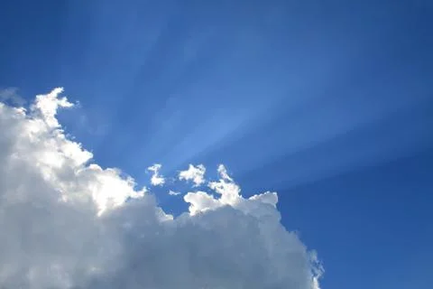 Sunny clouds with rays of light Stock Photos