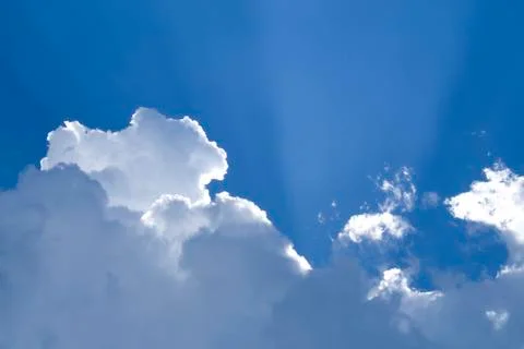 Sunny clouds with rays of light Stock Photos