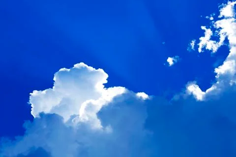 Sunny clouds with rays of light Stock Photos