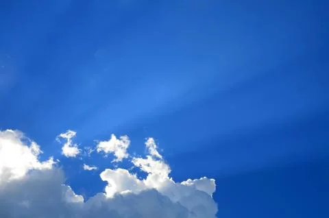Sunny clouds with rays of light Stock Photos