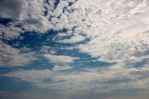 Sunny cloudy sky Stock Photos