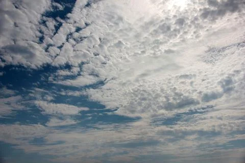 Sunny cloudy sky Stock Photos