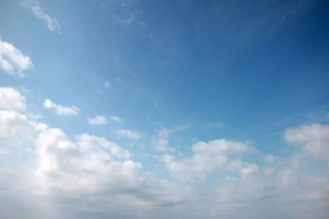 Sunny cloudy sky Stock Photos